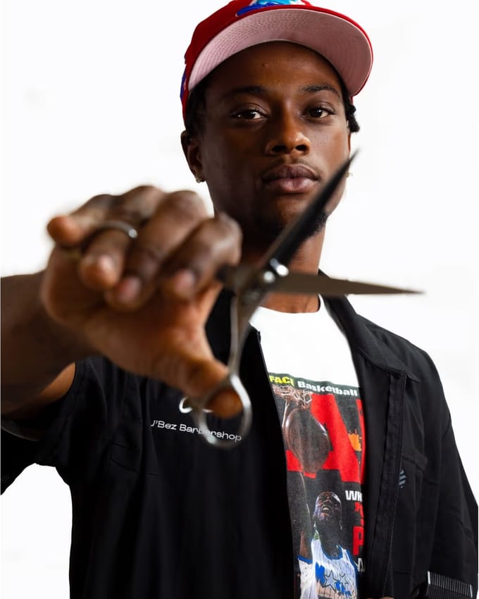 Sheldon, barber at J’Bez.