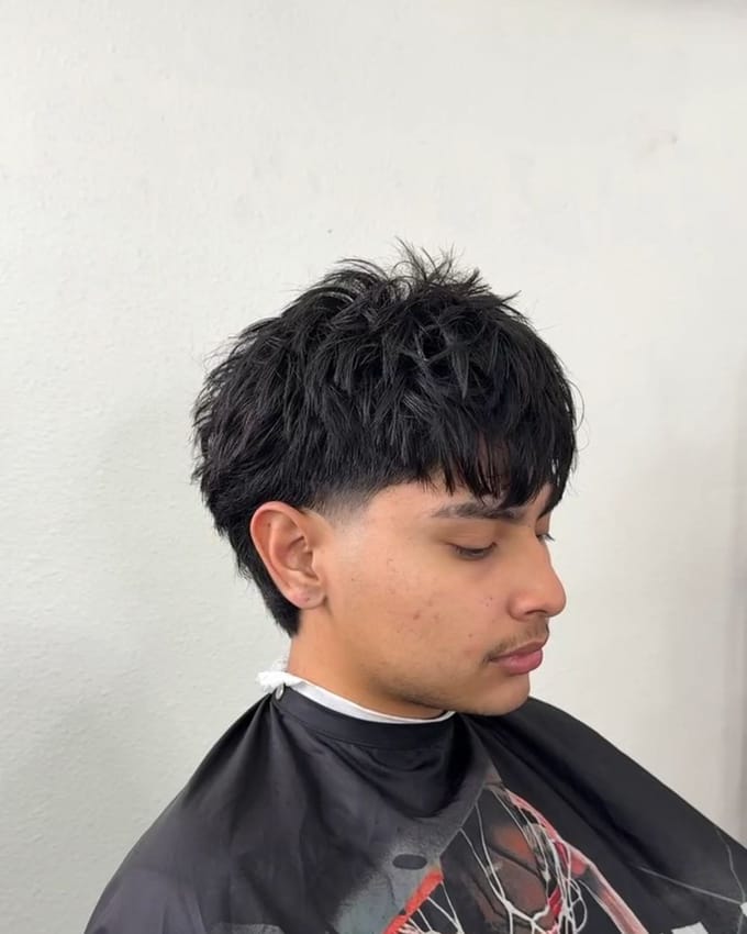 A haircut by Jacob at J’Bez.