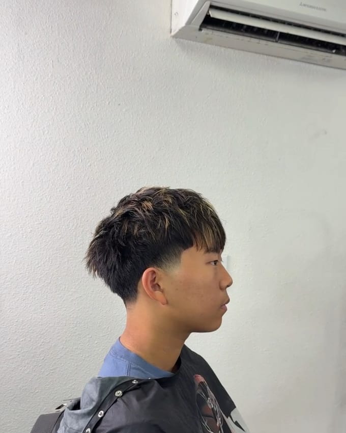 A haircut by Jacob at J’Bez.