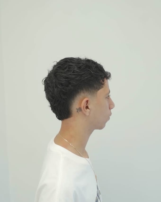 A haircut by Kade at J’Bez.