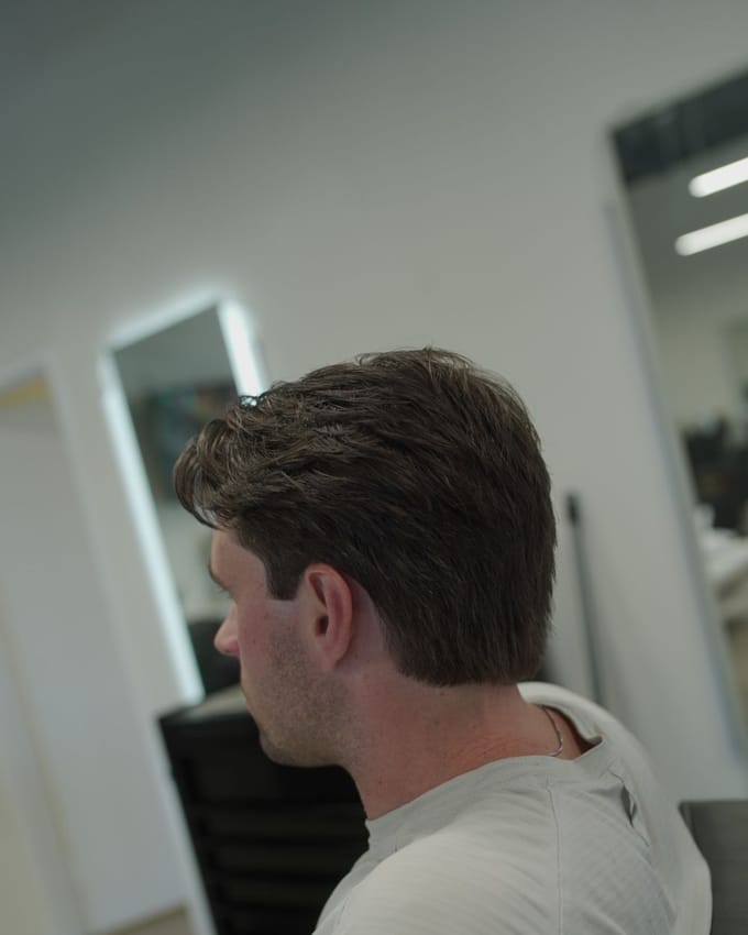 A haircut by Nick at J’Bez.