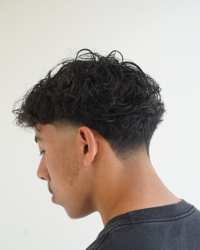 A haircut by Paul at J’Bez.