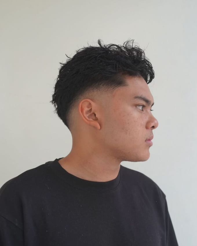 A haircut by Paul at J’Bez.