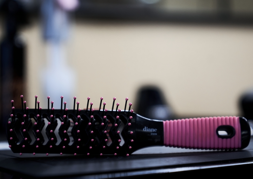 black and pink comb in a barbershop and salon