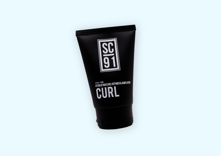 black tube of hair care product